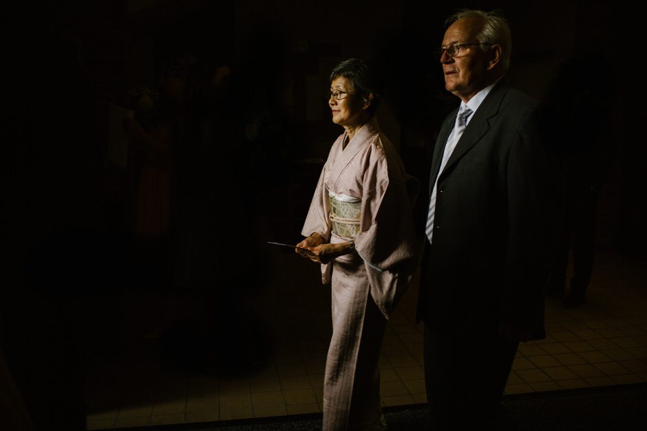 couple walking out of catholic church in spring lake michigan