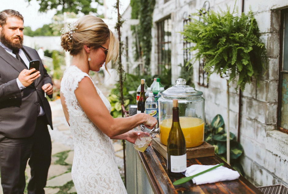 bride pouring a drink
