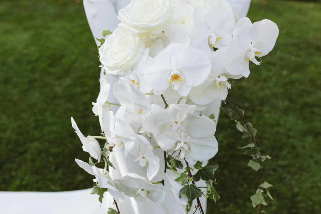 gorgeous bouquet of  white orchids at this mackinac island wedding venue