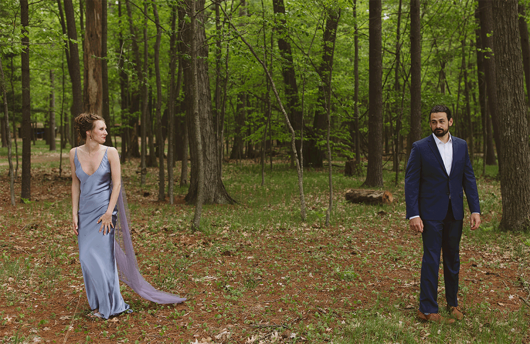 couple seeing each other for the first time and turning to look at each other 